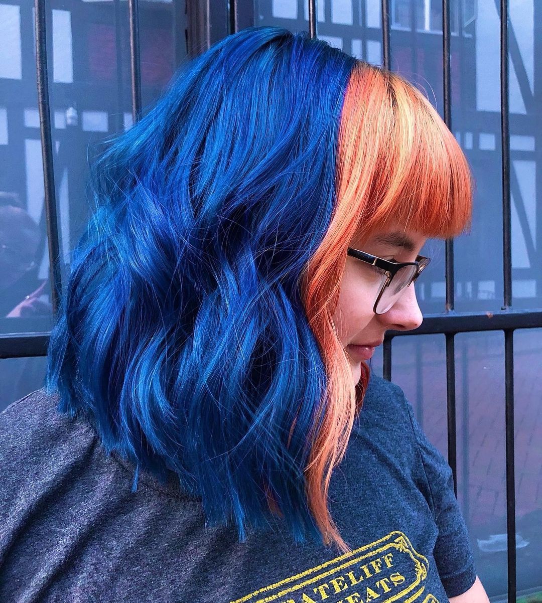 Crazy Color CASA UGC close up image of woman with blue and orange hair 