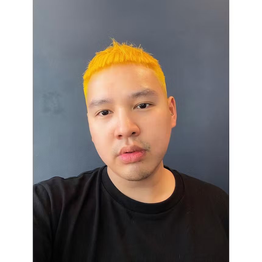 user generated image of man with bright yellow short hair