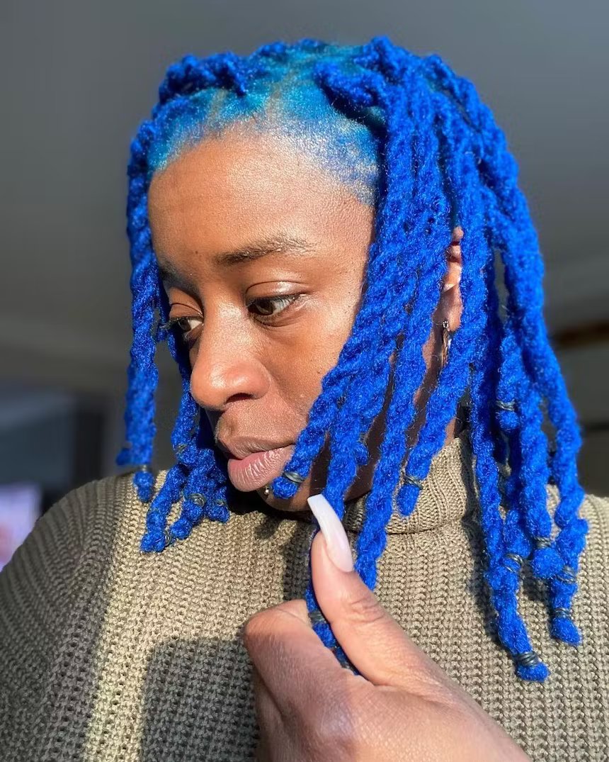 user generated close up image of woman with bright electric blue hair
