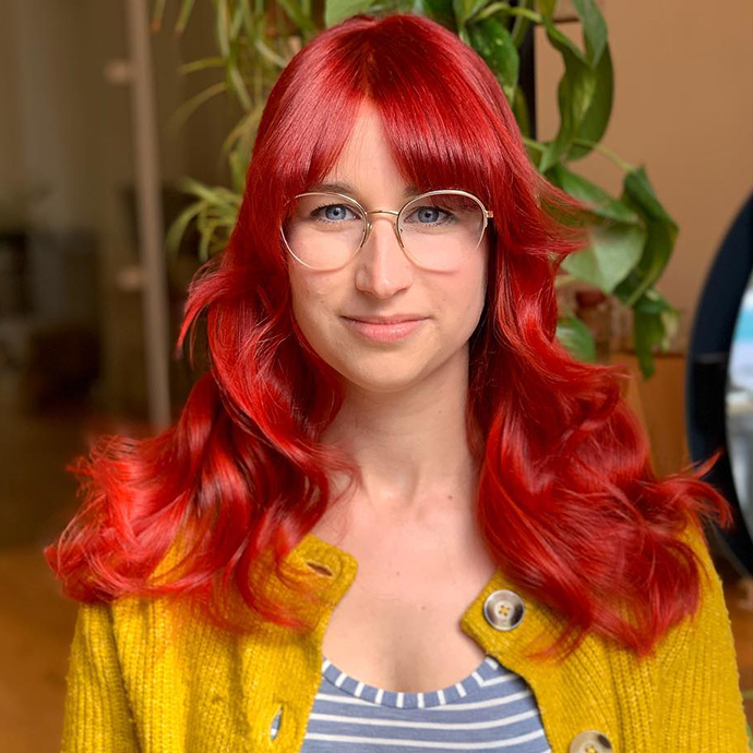 user generated image of a woman with long red wavy hair