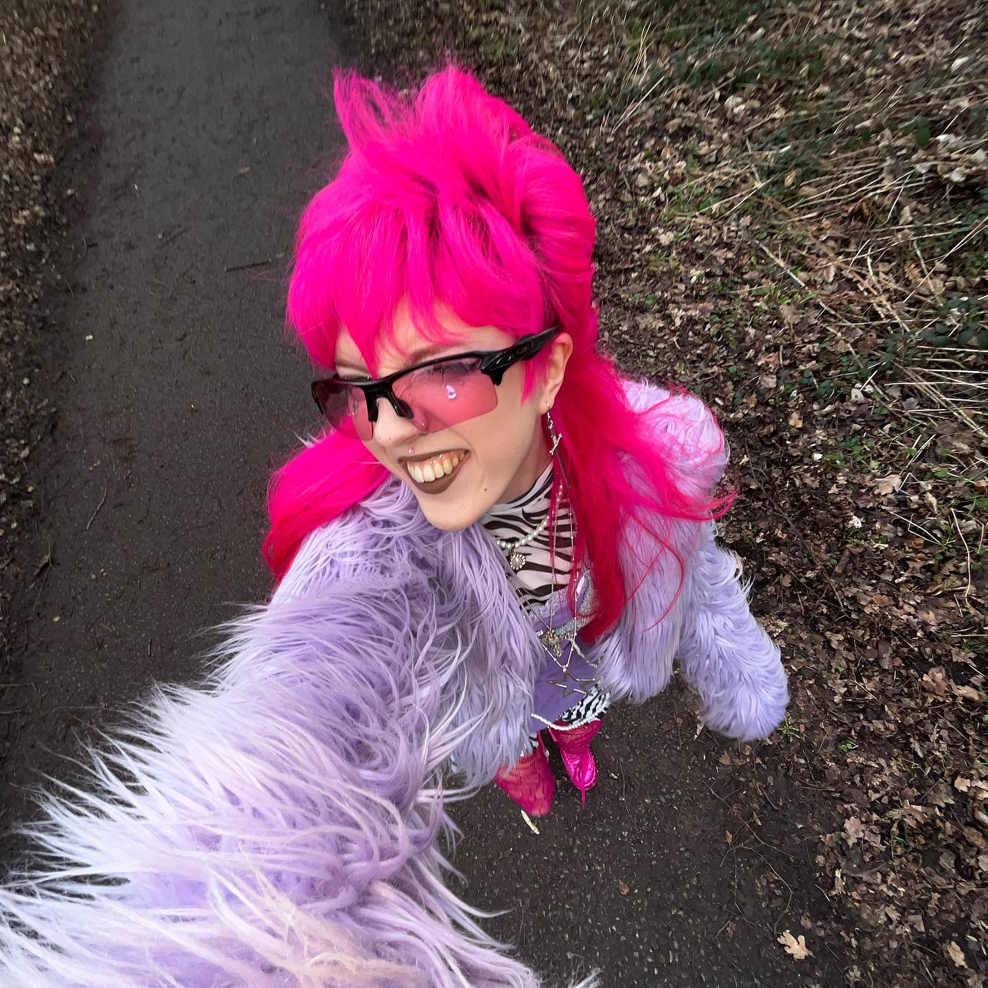 user generated image of girl with bright hot pink hair