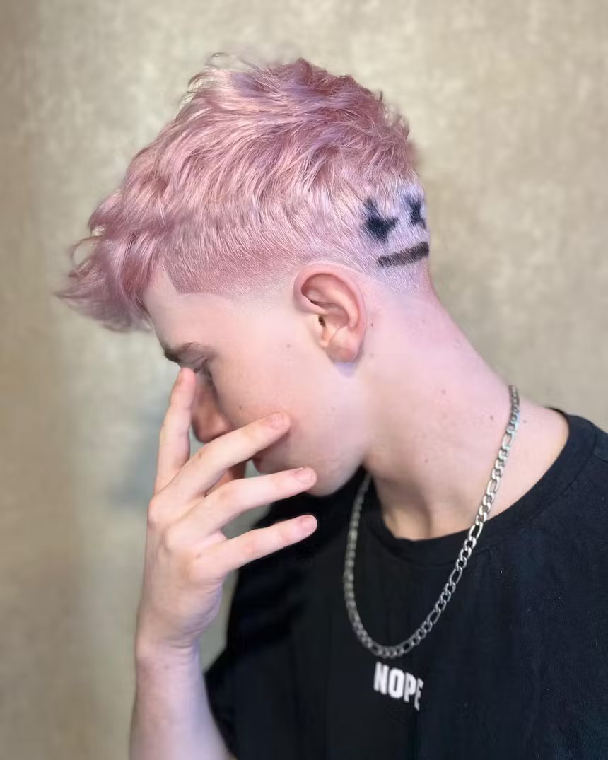 user generated image of close up of man with metallic light pink short hair